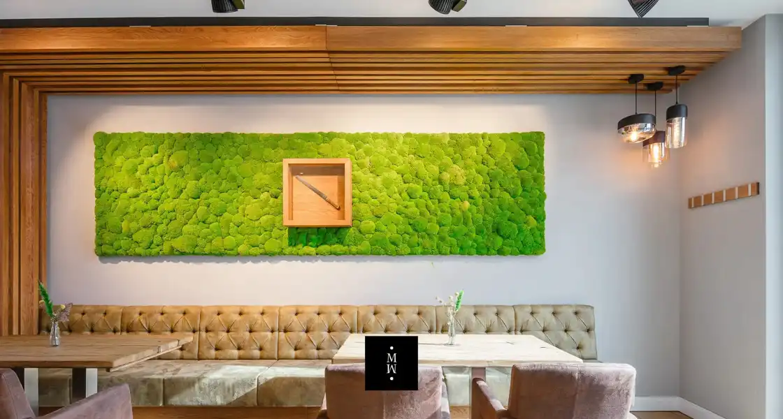 a green wall art on a wall