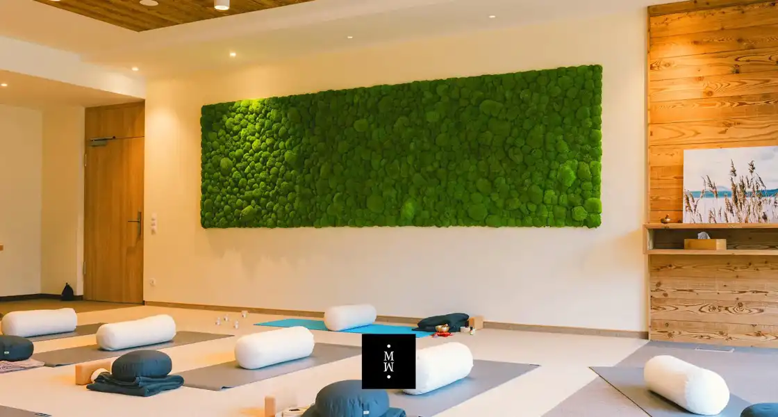 a room with yoga mats and mats