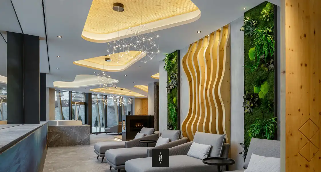 a room with a fireplace and couches