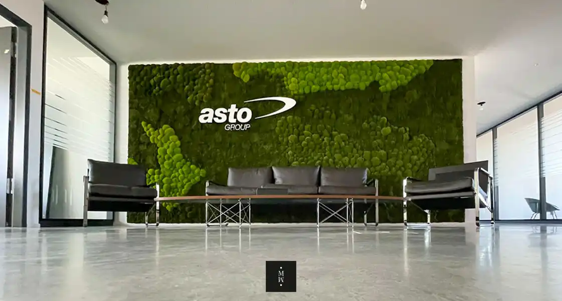 a group of chairs in front of a wall