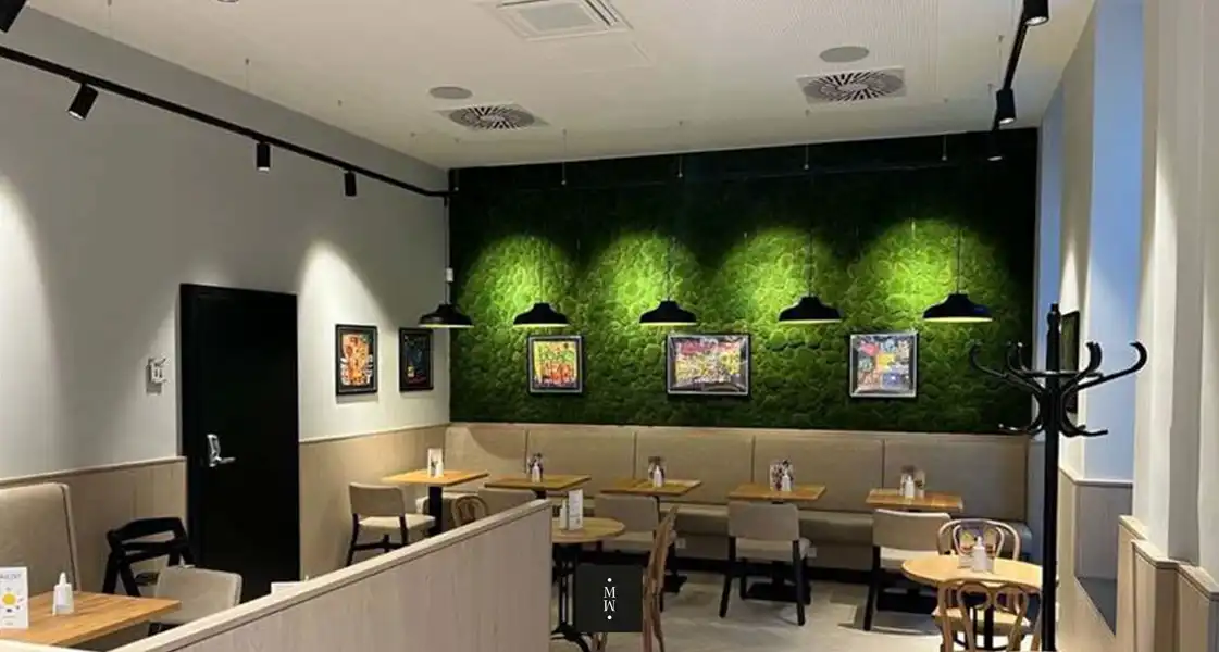 a room with tables and chairs